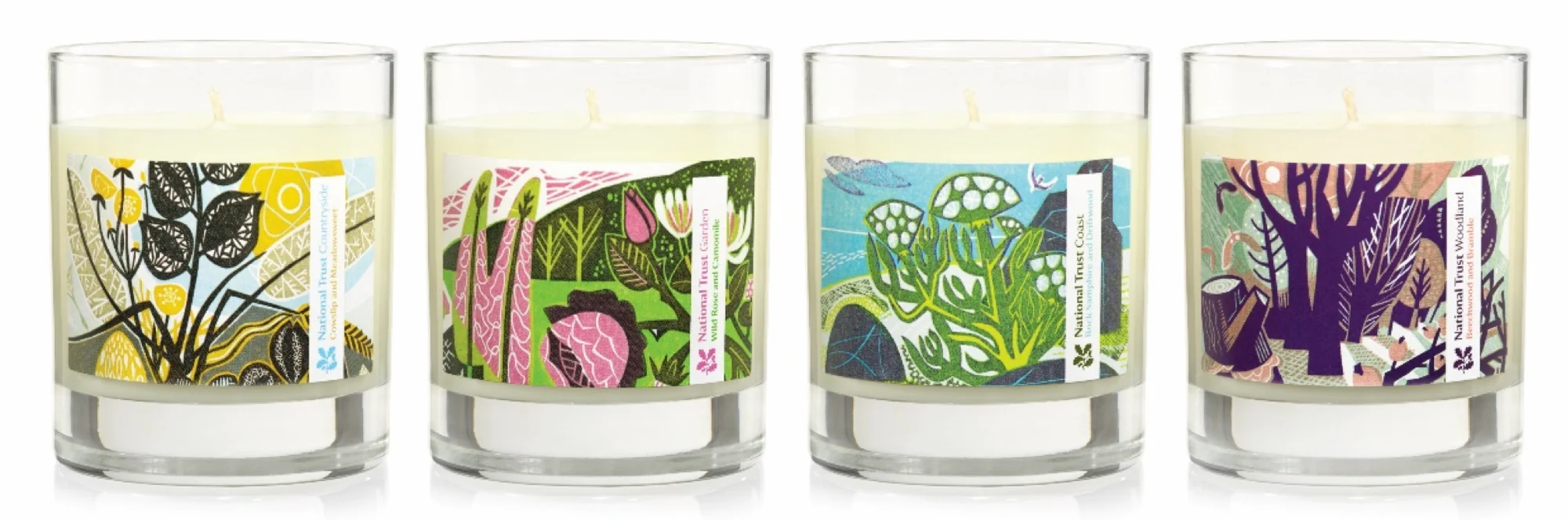 Four National Trust scented candles showing the illustrated label set